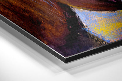 Angled product view of brushed aluminum Dibond wall art featuring horses in rich earth tones, reds, and blues with visible layered edge construction.