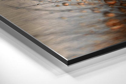 Close-up angled view of Dibond wall art edge showing layered aluminum and black core construction with brushed metal surface.