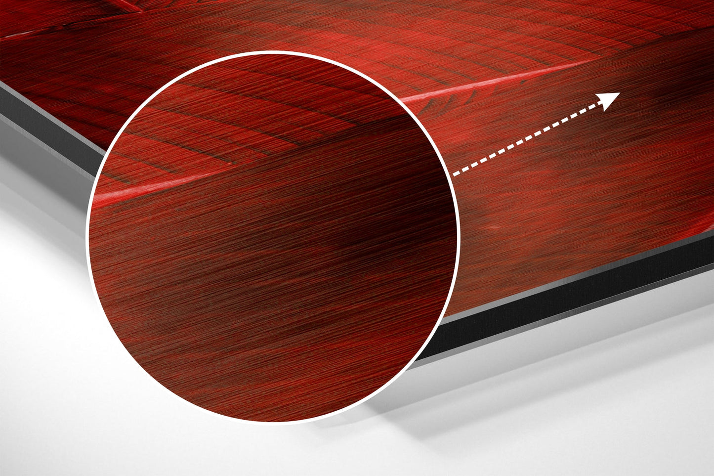 Red brushed aluminium circular design with white border and directional arrow on angled perspective background.