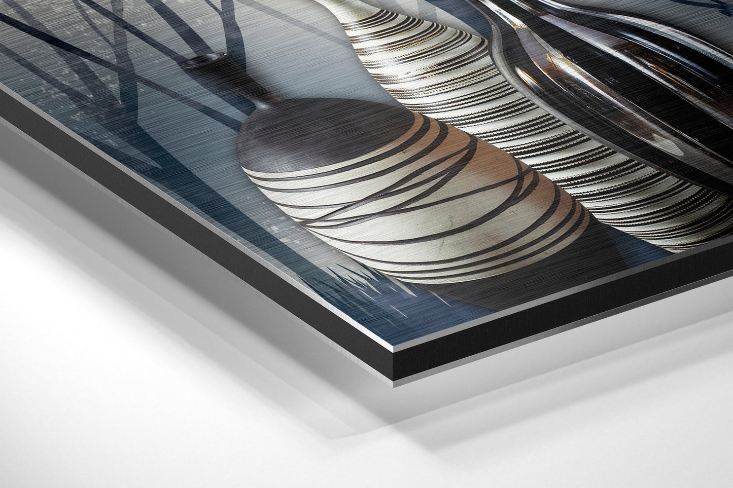 Angled corner view of Vases of Dreams brushed aluminium Dibond wall art showing layered curved metallic forms in silver, bronze, and charcoal tones.