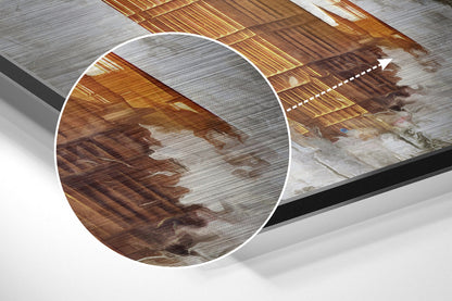 Close-up detail of brushed aluminium Dibond wall art showing wooden beam ceiling interior with magnified circular inset highlighting texture and finish.