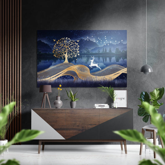 Modern interior setting with gold and blue tree artwork mounted above wooden dresser with plants and decor accessories.