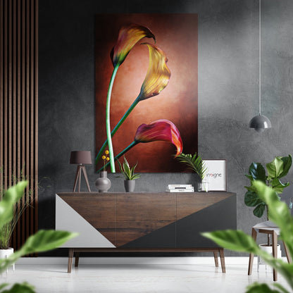 Lilly Brushed Aluminium Dibond Wall Art displayed on dark textured wall above wooden console table with warm orange and red flower tones.
