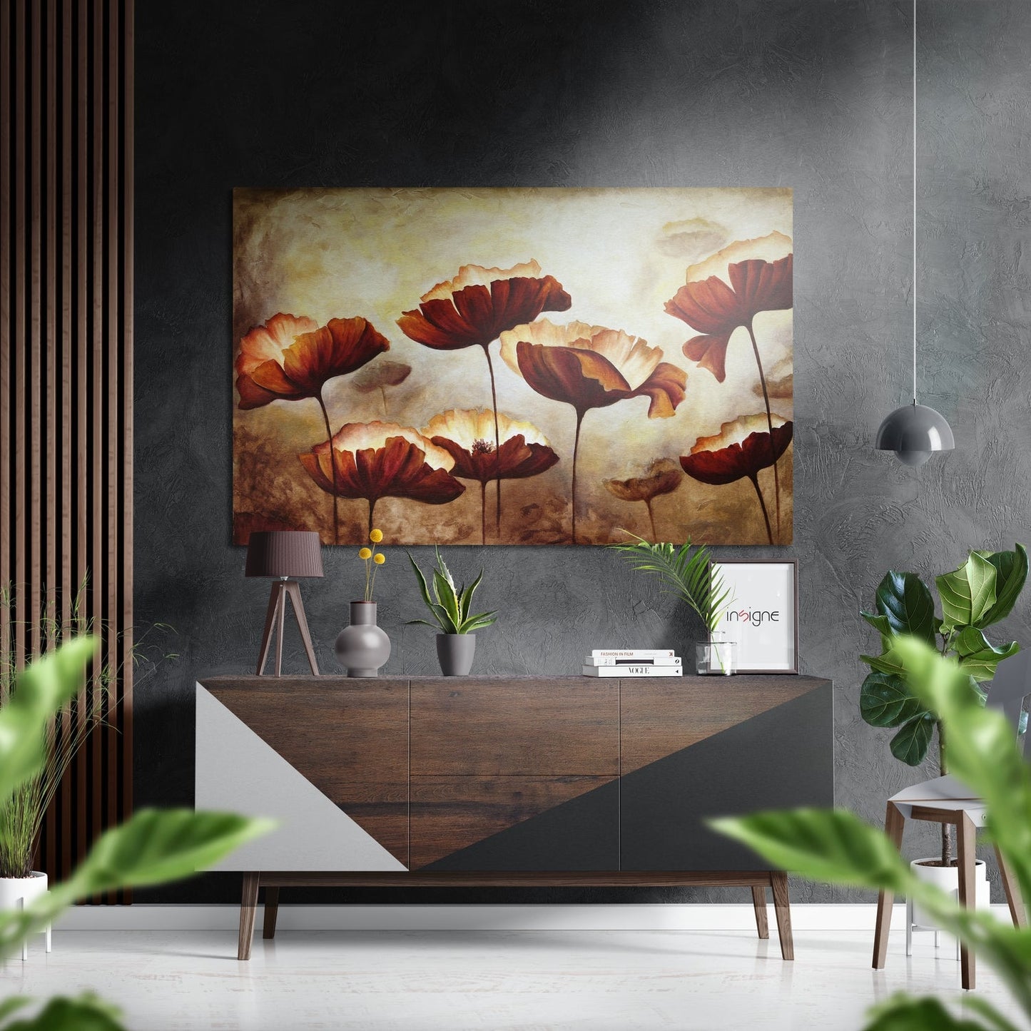 Modern interior with red and gold poppy flower canvas art hanging above wooden console table with potted plants and pendant light.