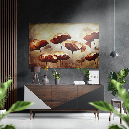 Modern interior with red and gold poppy flower canvas art hanging above wooden console table with potted plants and pendant light.