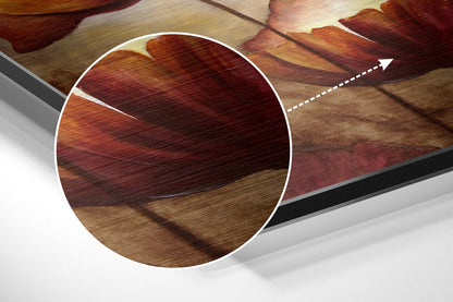 Close-up detail showing wood grain texture with burgundy, orange, and tan tones on brushed aluminum surface.