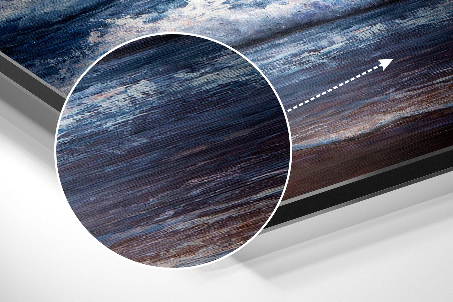 Close-up detail of brushed aluminum Dibond wall art showing blue and brown wood grain texture with magnified circular view and directional arrow.