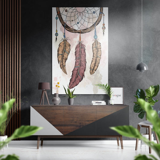 Modern interior room with blush feather dreamcatcher artwork displayed above wooden dresser with plants and pendant lighting.