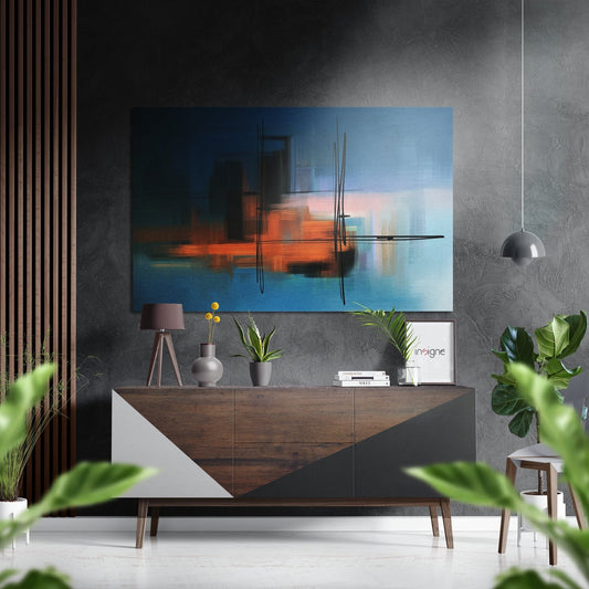 Modern living room with abstract blue and orange brushed aluminium wall art displayed above wooden credenza with plants and decor.