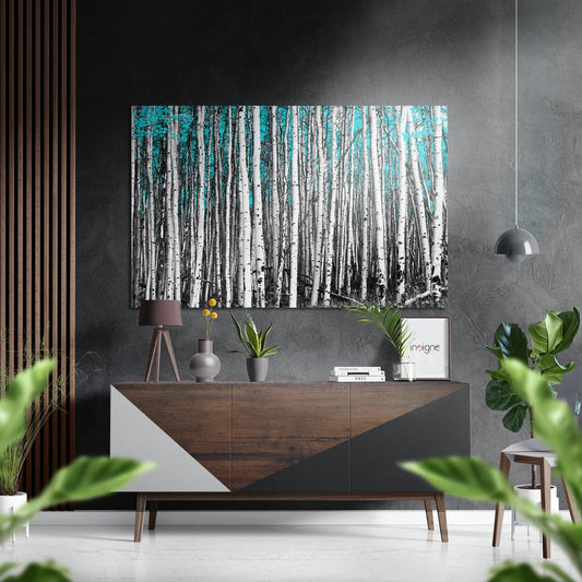 Modern living room interior featuring birch forest wall art above wooden credenza with decorative accessories and plants.