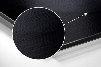 Abstract 3D composition featuring a black brushed circle with white border and directional arrow on layered gray and white planes.