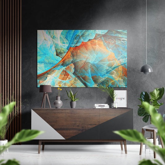 Modern interior with turquoise and orange abstract leaf vein artwork displayed above wooden console table with décor and plants.