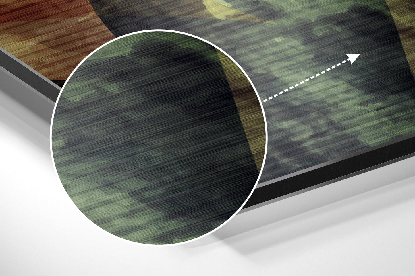 Close-up angled view of brushed aluminium Dibond showing green and dark striped texture with white circular highlight and directional arrow.