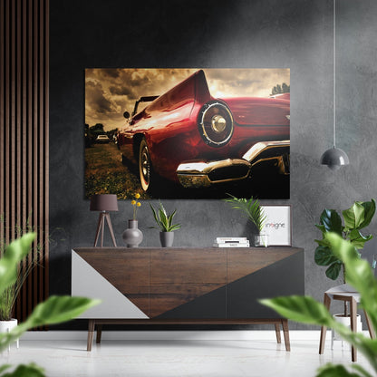 Red vintage convertible sports car with raised hood displayed on brushed aluminium wall art in modern interior setting.