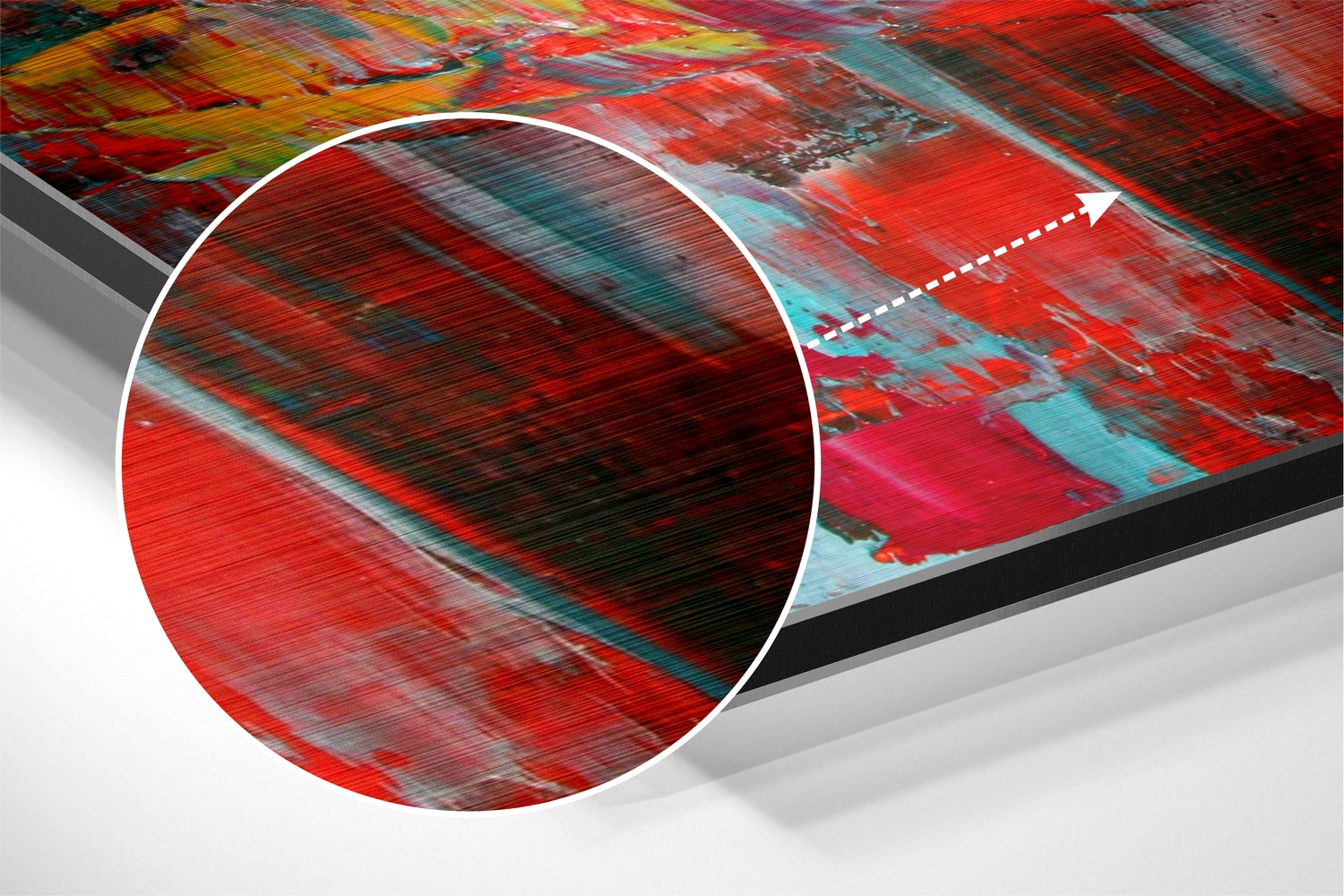 Angled perspective view of brushed aluminum wall art with abstract red, teal, and yellow striped patterns and circular magnified detail.