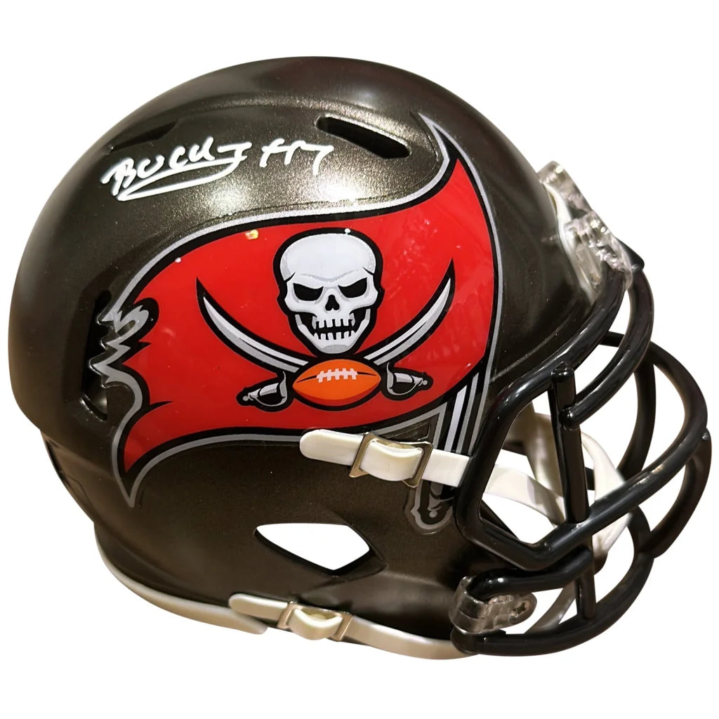 Black tampa bay buccaneers mini helmet with red silver skull crossbones logo and bucky irving autographed in white script