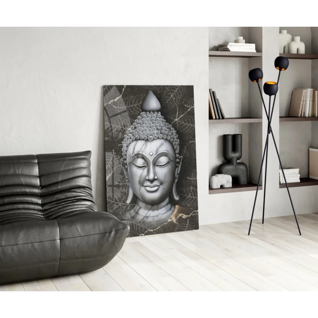 Serene silver Buddha face glass wall art with leafy details on canvas