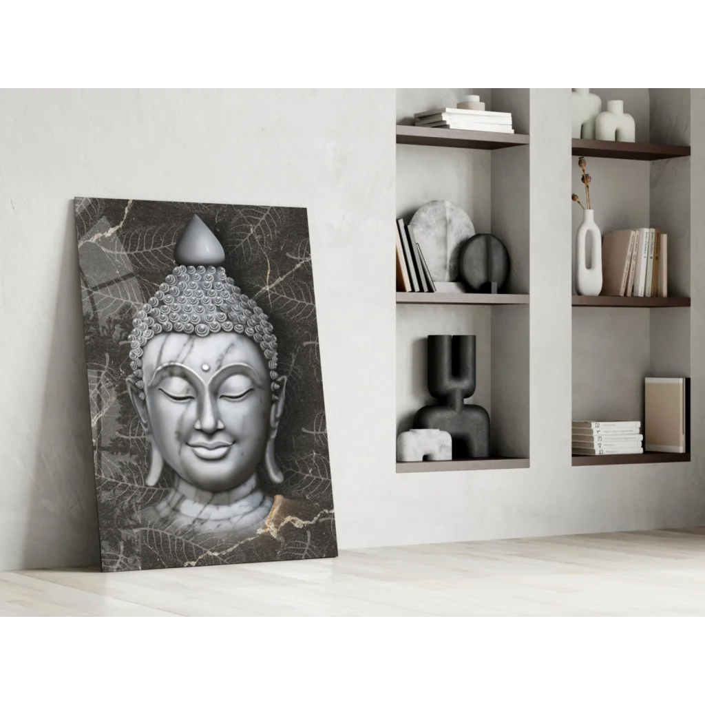 Serene silver Buddha face wall art with gold leaf accents on dark marble