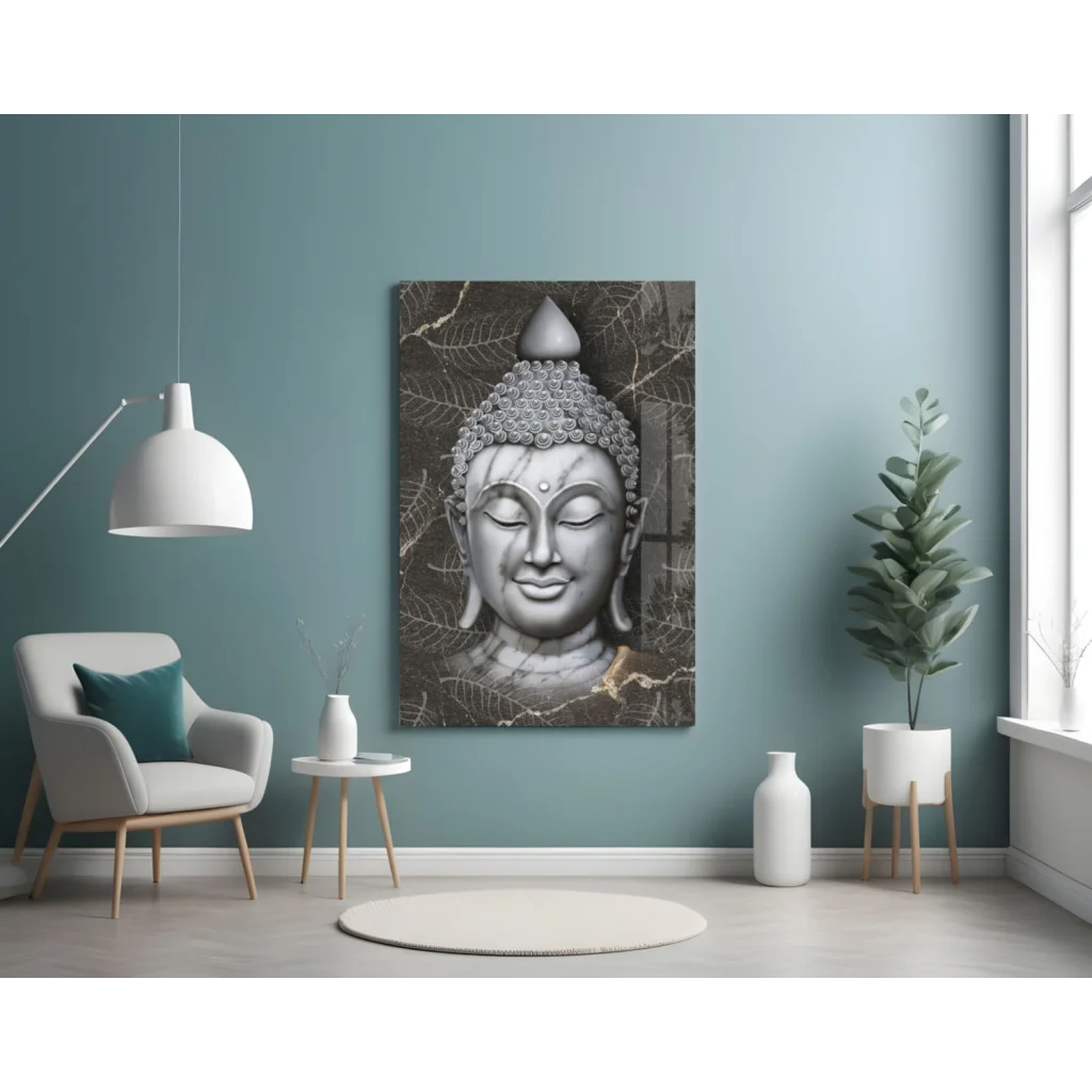 Serene silver Buddha face glass wall art with leafy details and gold accents