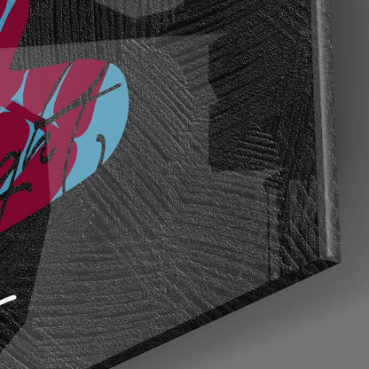 Vibrant Buddha tempered glass art with bold red and blue shapes on black