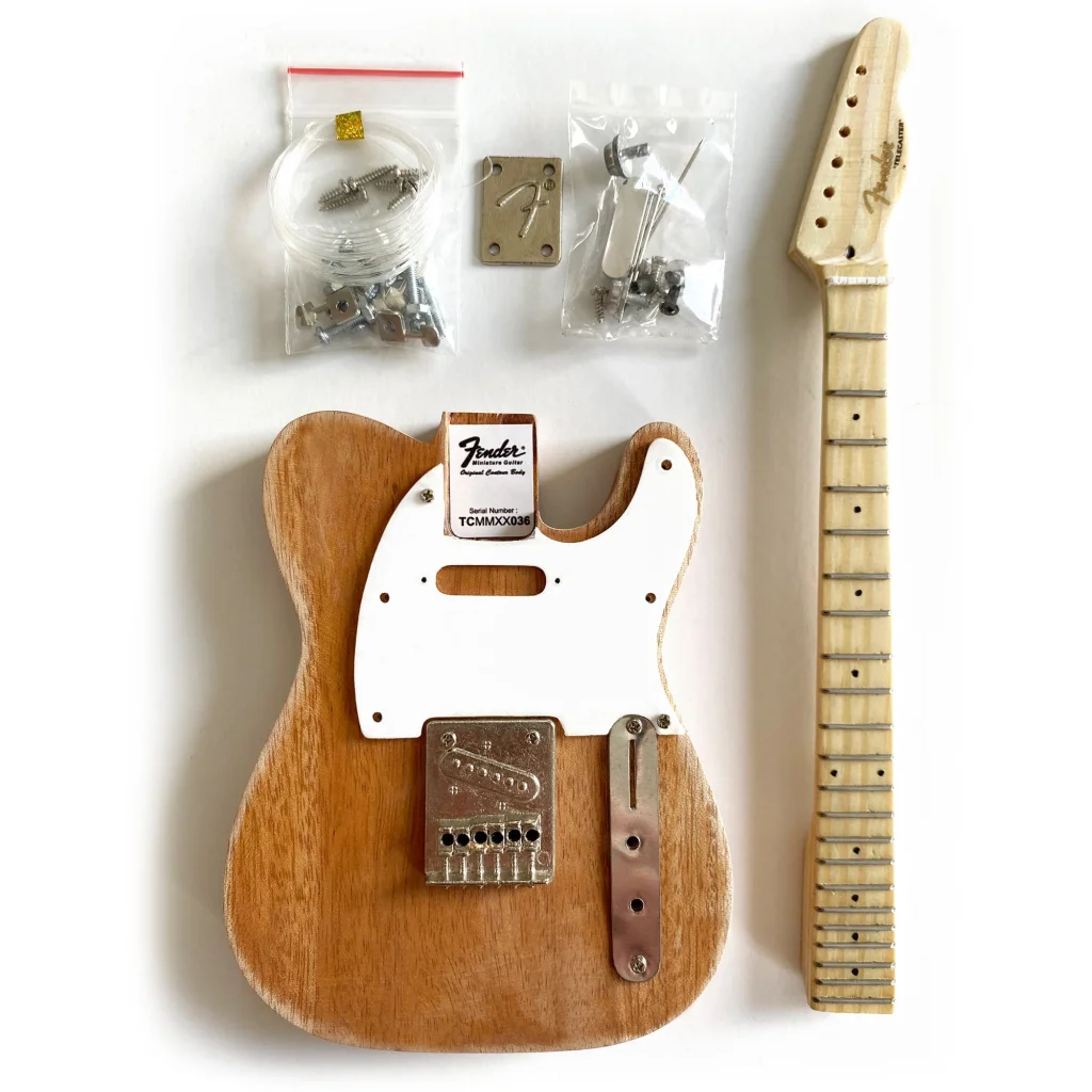 Axe Heaven Fender Telecaster mini guitar kit with natural wood and white pickguard