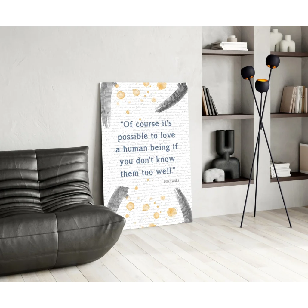 Bukowski quote wall art on white canvas with black feather and gold watercolor splashes