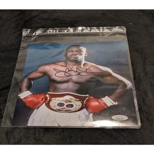 Buster Douglas autographed victory photo with JSA COA and championship belt