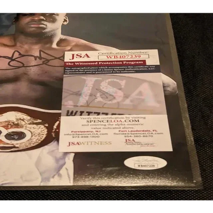 Buster Douglas autographed victory photo with JSA COA for authentic collectible display