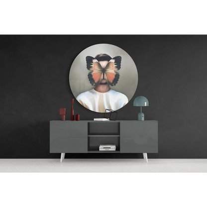 Circular tempered glass art print of butterfly face in earth tones