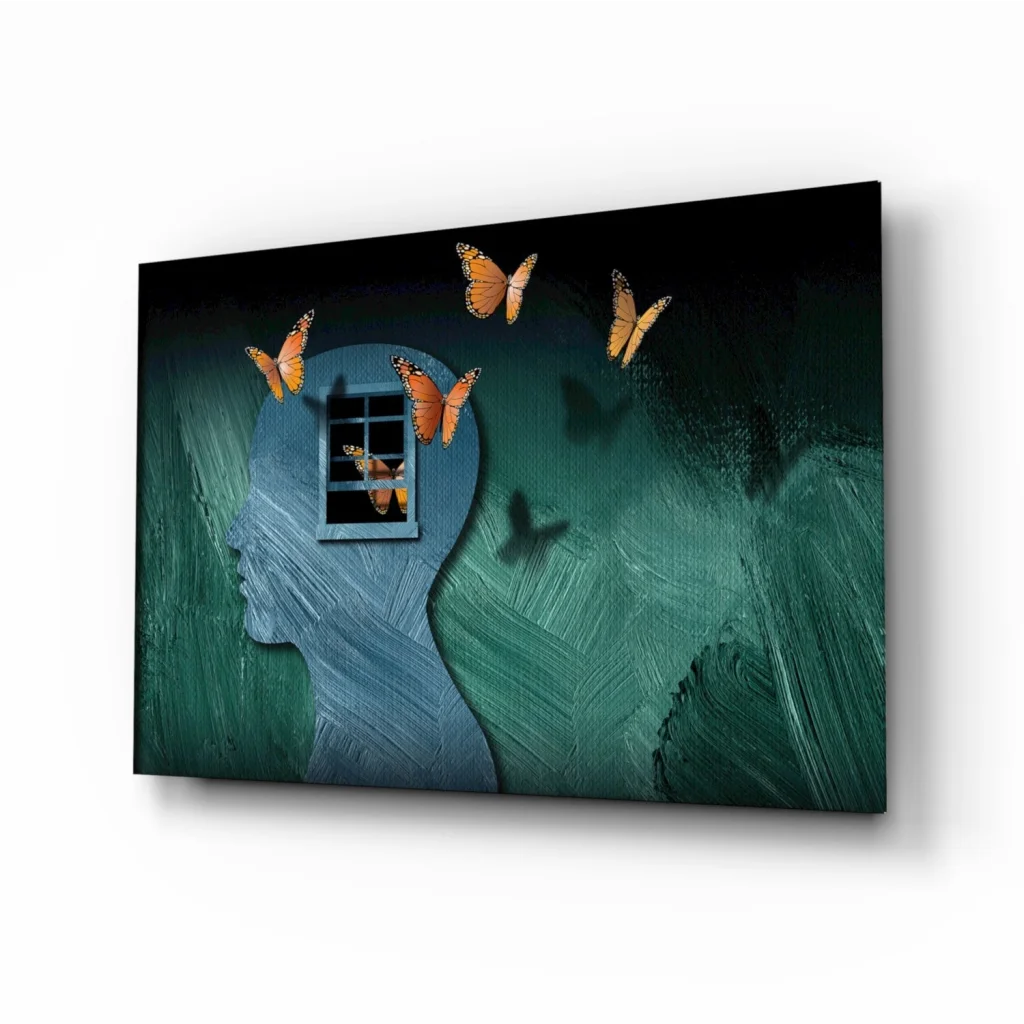 Stylized blue head silhouette with window and orange butterflies on teal wall art canvas