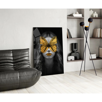 Striking black-and-white wall art print of woman with golden butterfly wings over eyes