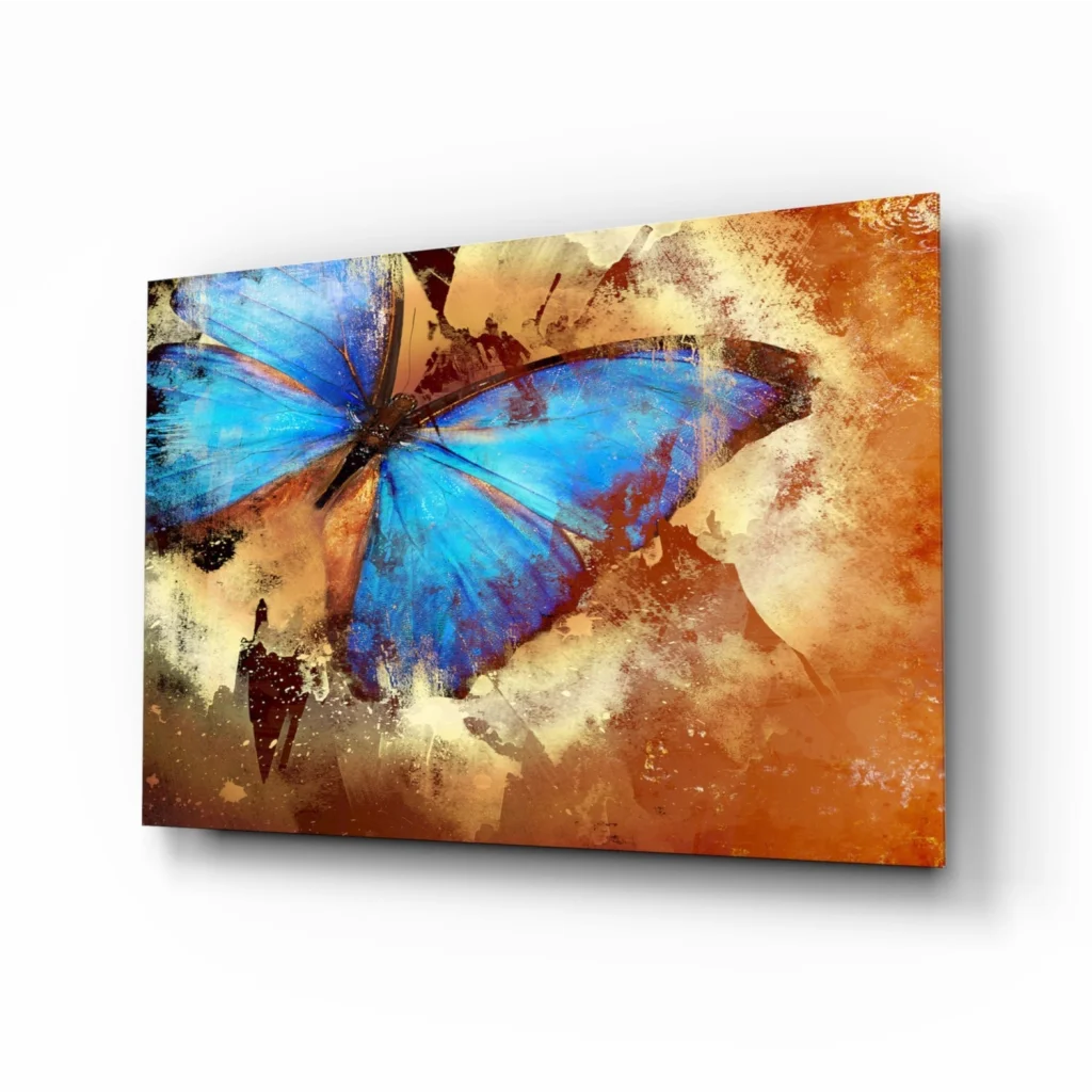 Vibrant blue butterfly glass wall art on textured earth tones canvas