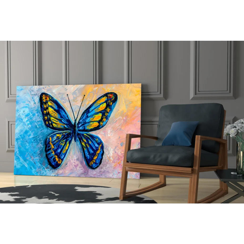 Vibrant blue and yellow butterfly glass wall art print on textured canvas