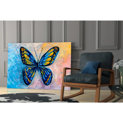 Vibrant blue and yellow butterfly glass wall art print on textured canvas