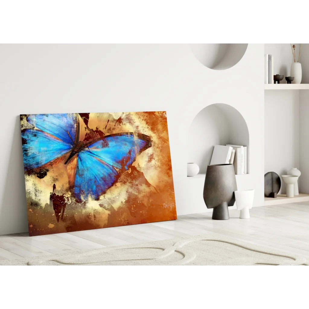 Vibrant blue butterfly glass wall art with textured earthy orange tones