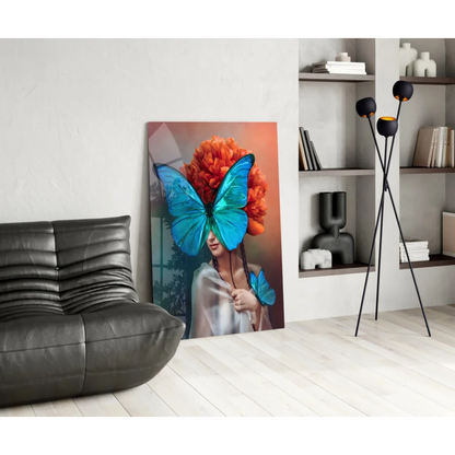 Vibrant glass wall art of woman with orange floral headdress and blue butterflies