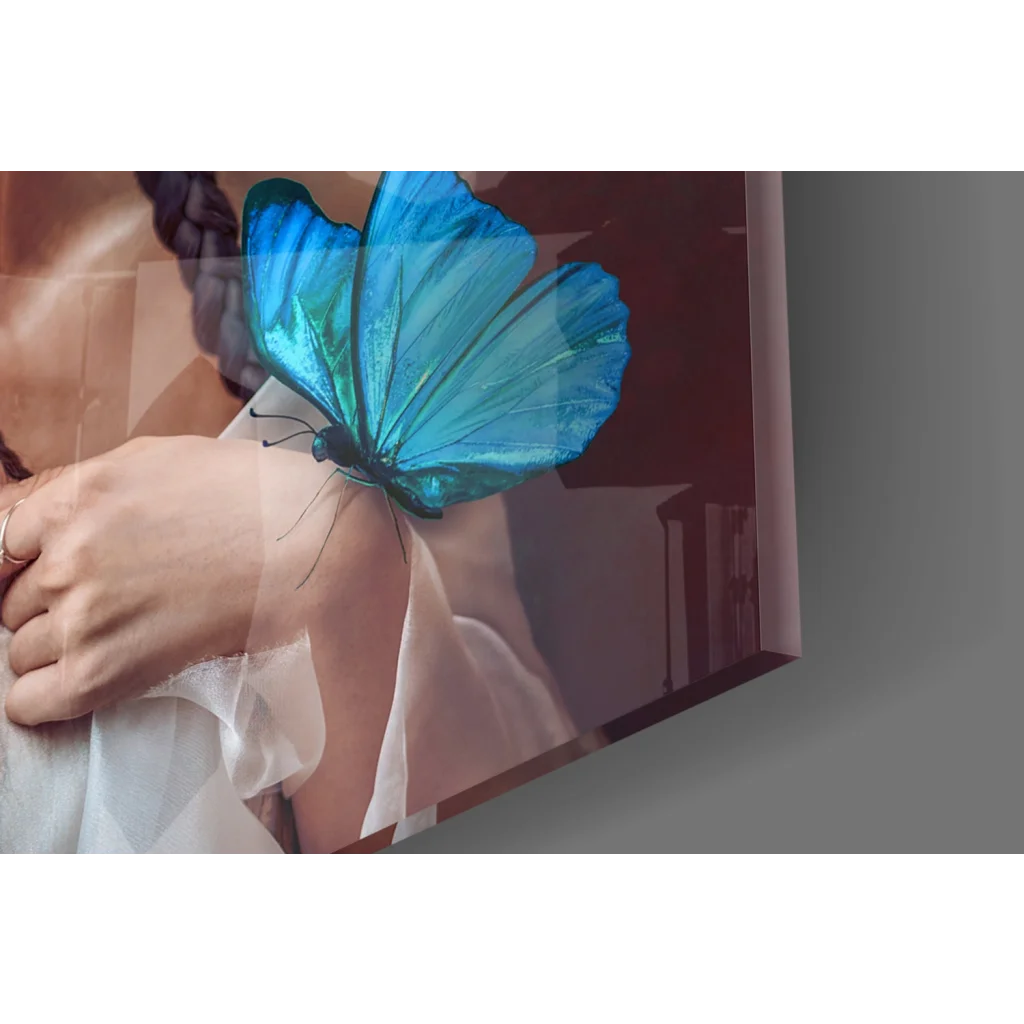 Vibrant blue butterfly on womans arm in glass wall art print