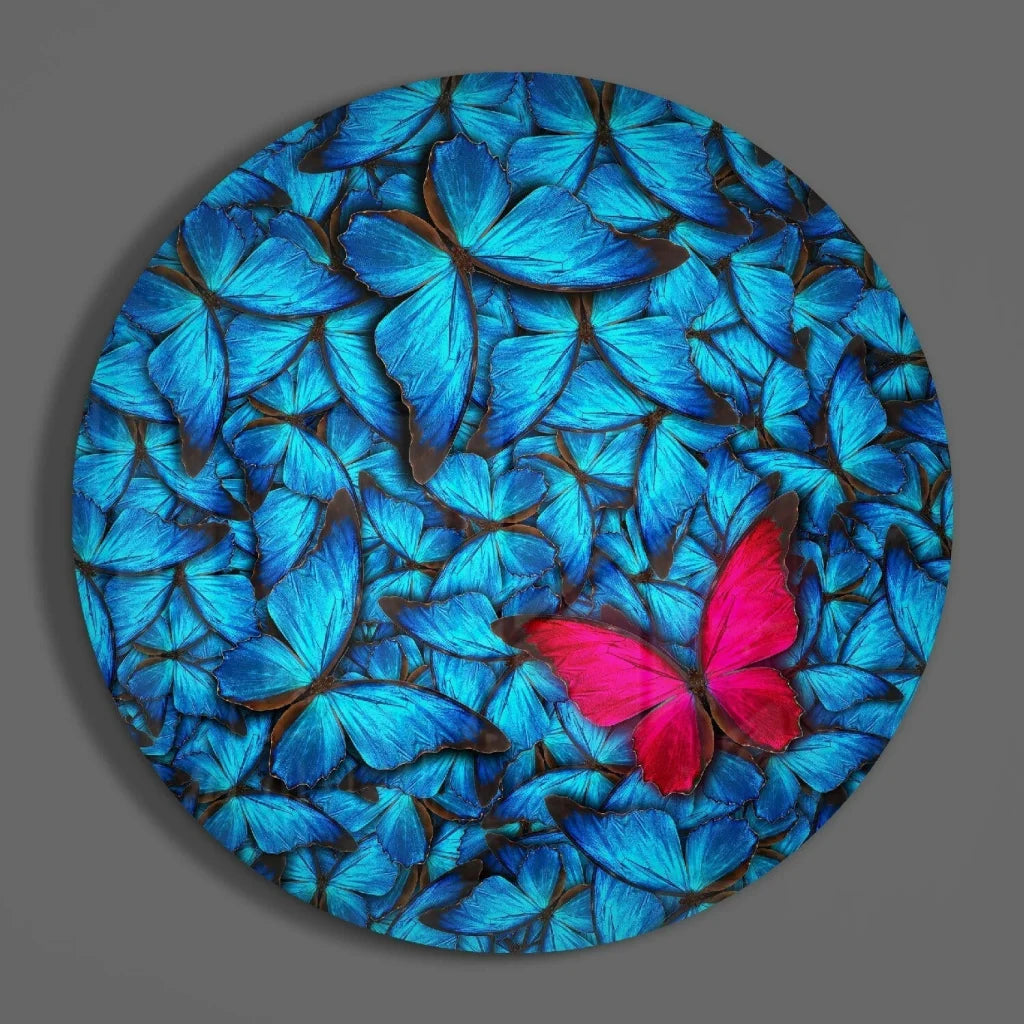 Vibrant tempered glass art of blue butterflies with pink focal point