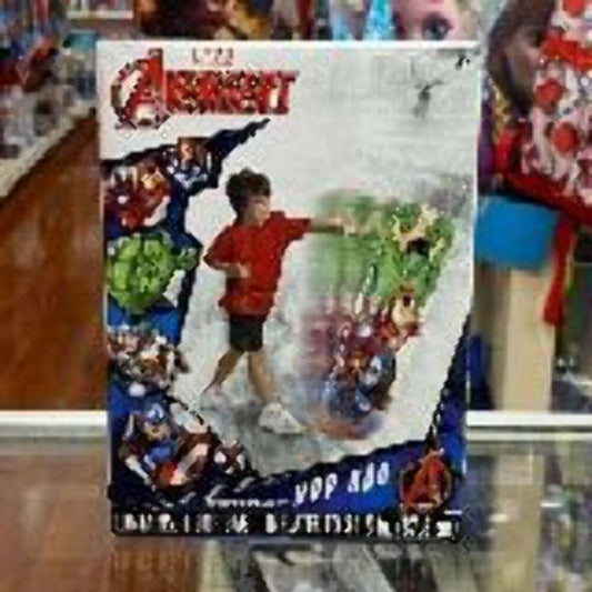 Marvel Avengers backpack front packaging displayed with illustrated child in red shirt surrounded by colorful superhero characters and green foliage.