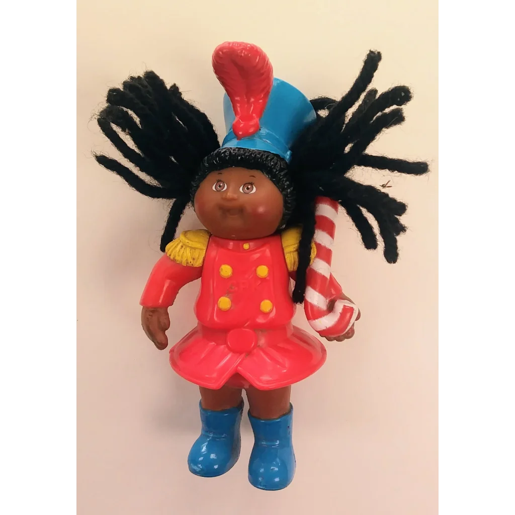 Cabbage Patch Kids Abigail Lynn majorette doll with giggles and hugs golliwog hat
