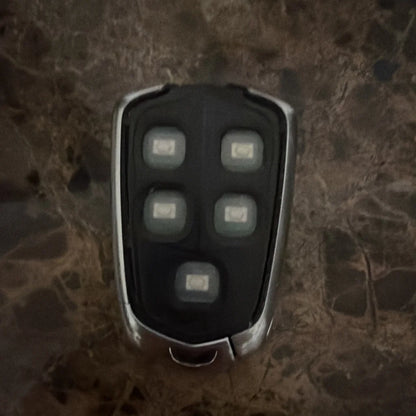 Cadillac XT4 2019 key fob black silver remote with 5-button grid