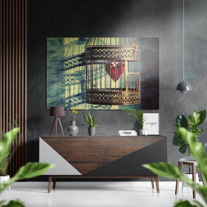 Golden birdcage with red heart on brushed aluminium dibond wall art