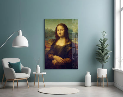 Mona Lisa glass wall art displayed on a teal wall above a white chair in a minimalist interior setting.