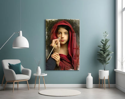 Portrait glass wall art depicting a young woman in a red head covering holding a paintbrush, displayed in a modern interior setting.