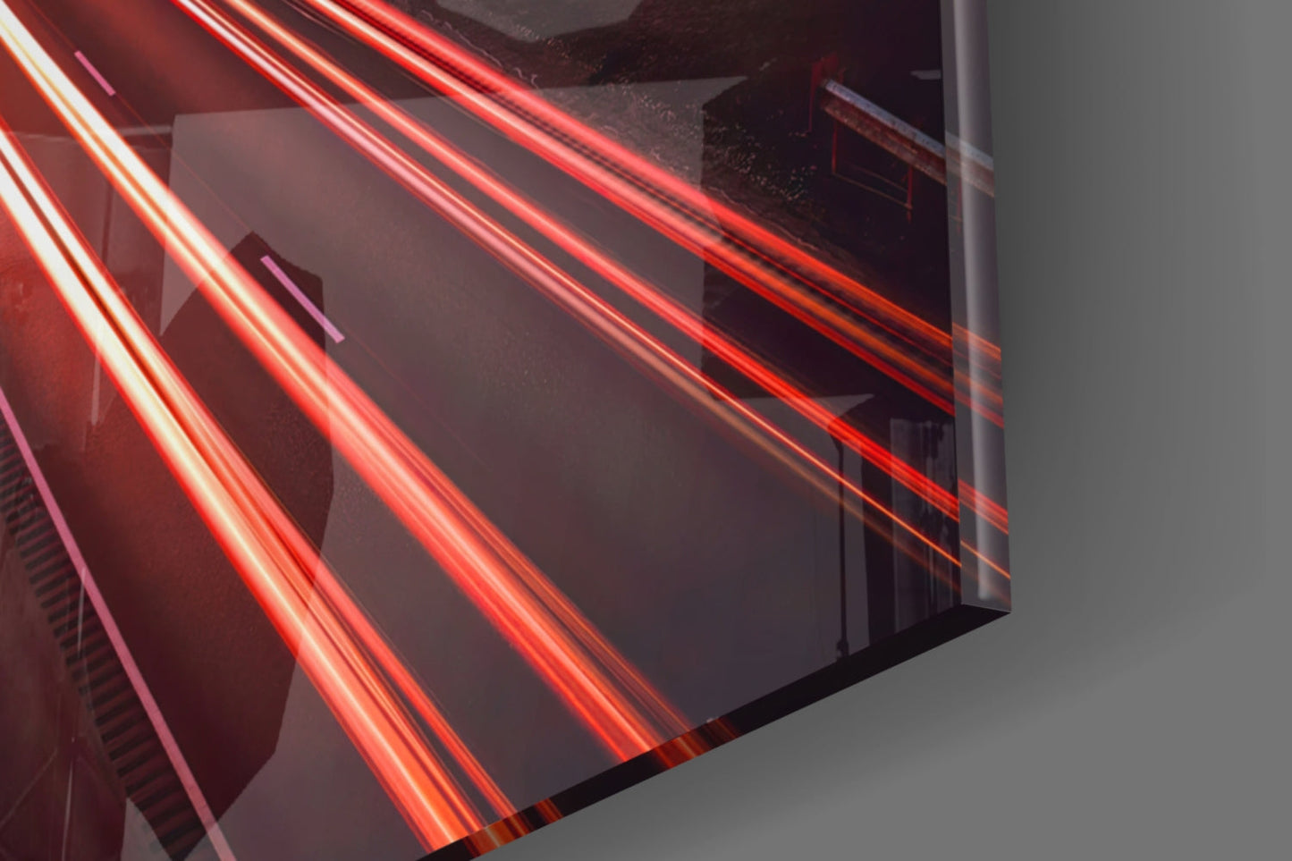 Close-up angled view of Road Glass Wall Art displaying red and white neon light tubes on dark glass surface.