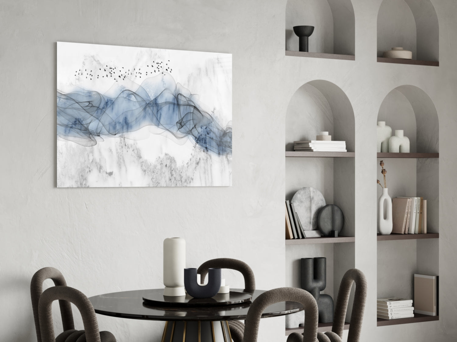 Blue Fog Glass Wall Art displayed above a round black dining table with curved chairs in a minimalist interior with built-in shelving.