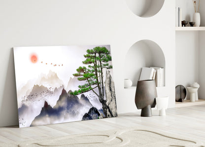 Abstract forest glass wall art leaning against white wall in minimalist interior with mountains, bonsai tree, and red sun design.