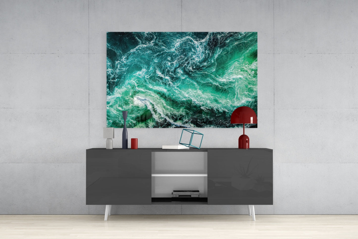 Green Waves Glass Wall Art displaying turquoise ocean waves mounted above a gray media console in a modern living room.
