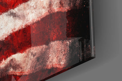 Close-up angled view of glass USA flag wall art showing red and white striped pattern with textured surface detail.