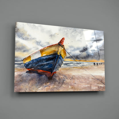 Colorful fishing boat with red, blue, and yellow hull beached on sand under cloudy sky, displayed as glass wall art.